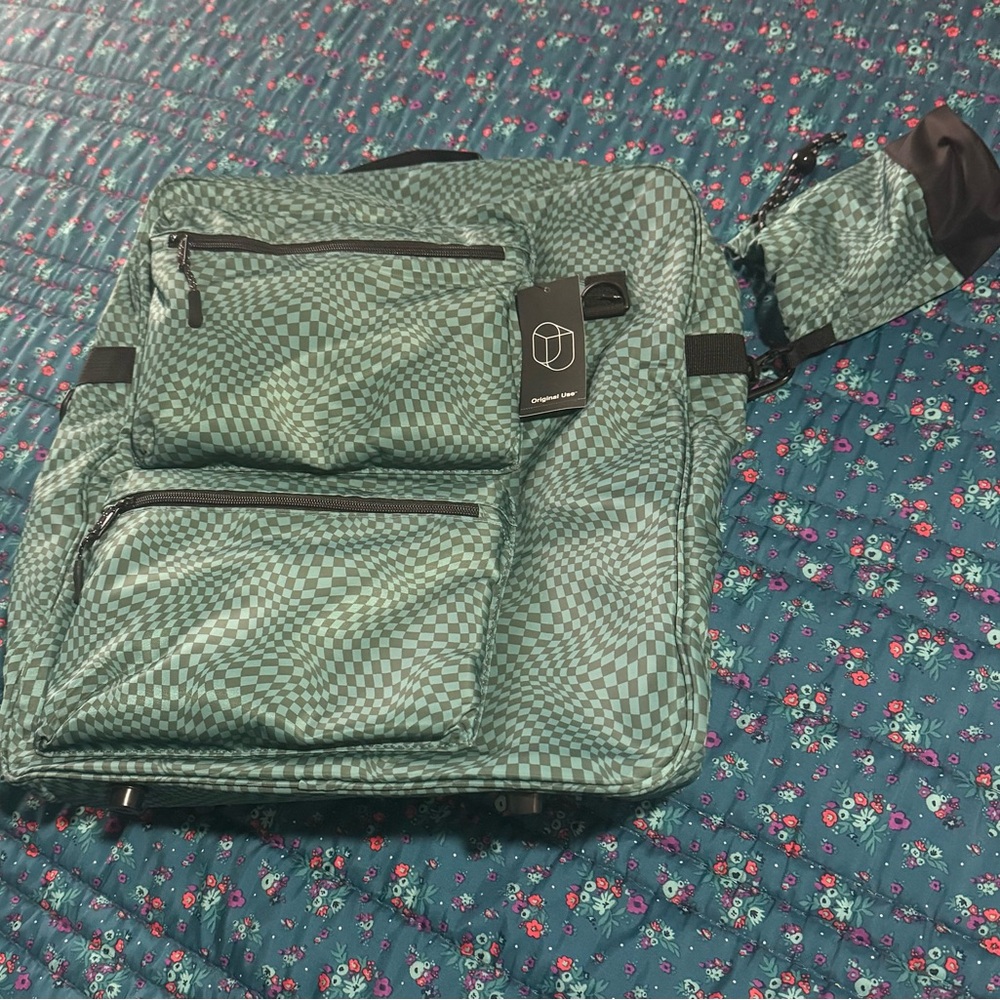 NWT Original Use backpack/travel bag in Checkered Green.